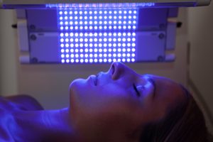 woman undergoing LED light therapy
