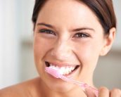 PureSmile - Woman Brushing Teeth