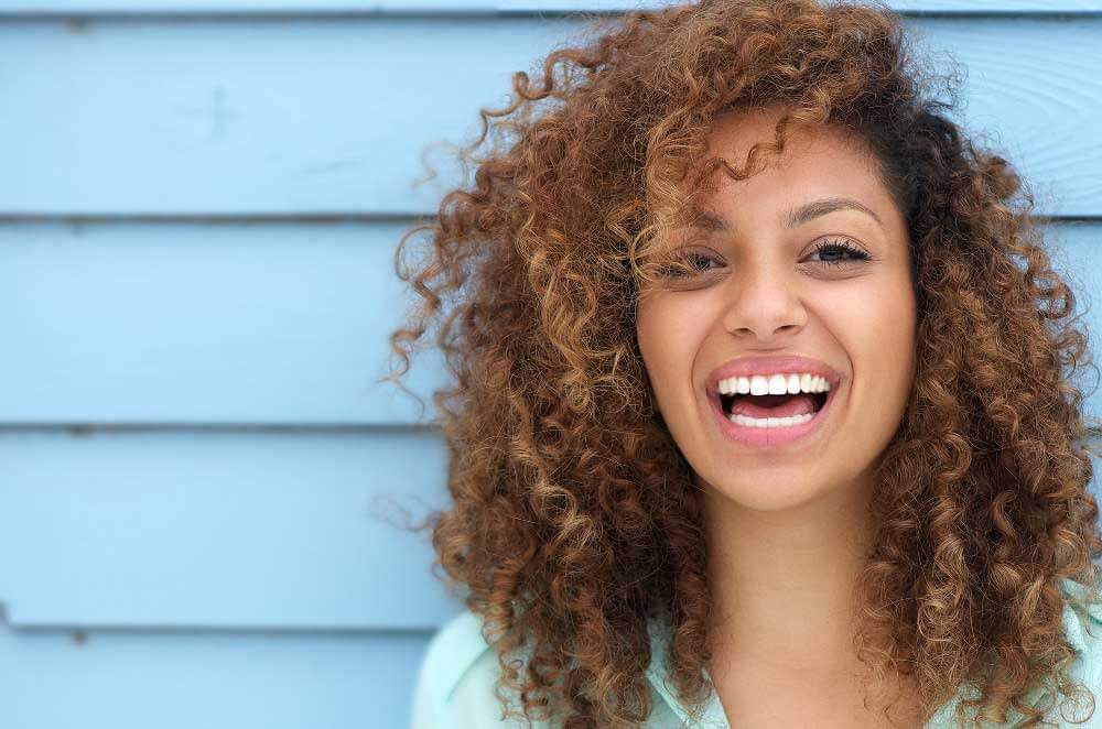 Teeth Whitening Information - Woman Smiling